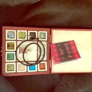 Necklace with interchangeable stone pendant